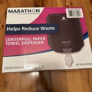 Marathon center pull paper towel dispenser; brand new.